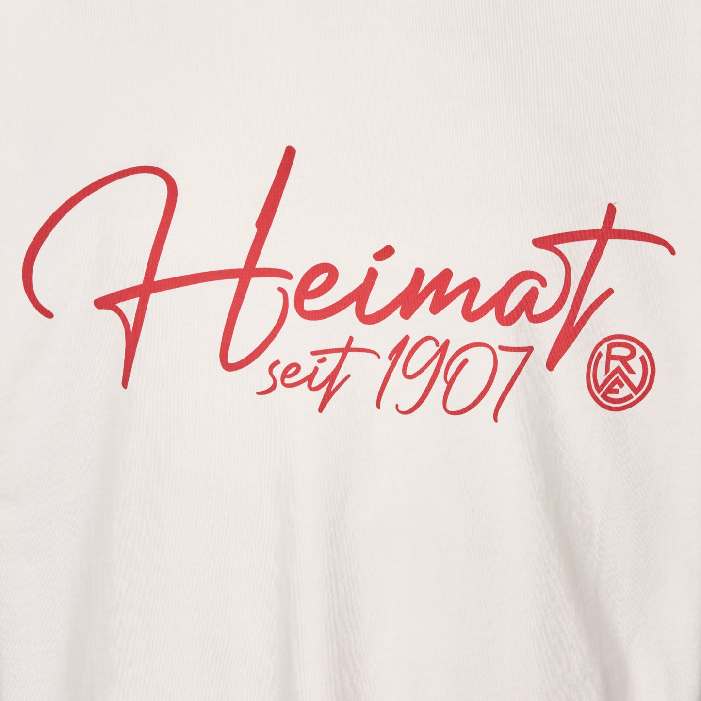 Nahaufnahme "Heimat seit 1907" Druck (geschwungene Schrift) mit RWE Logo